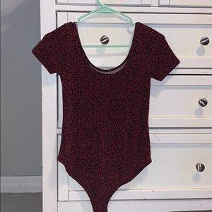 red and black bodysuit